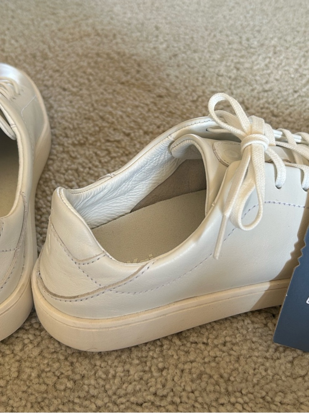 OluKai women’s All-White Leather Lace-Up Sneakers - Picture 3 of 6